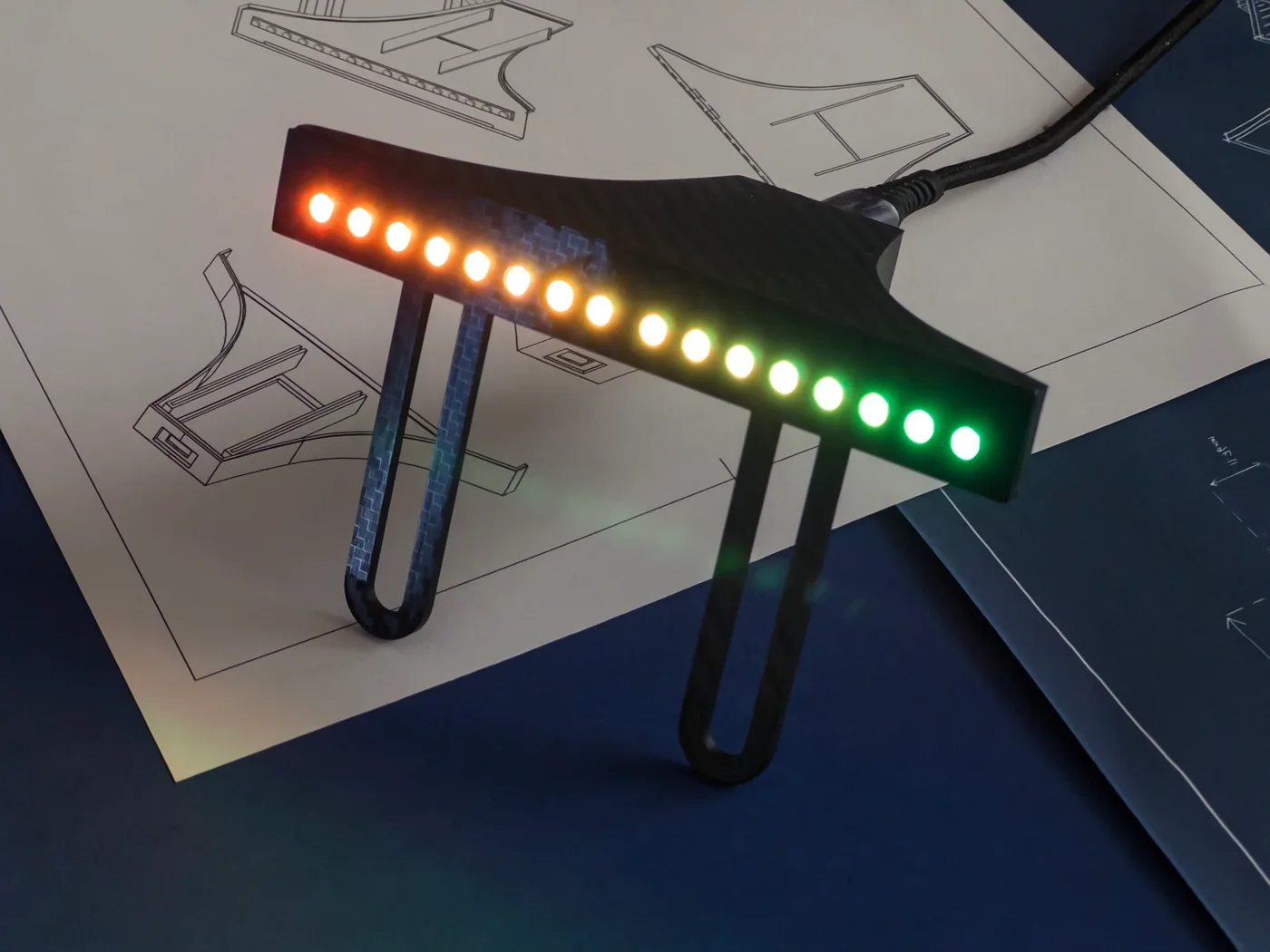 Rev Gauge sim racing shift light bar lit green to red across sixteen LEDs